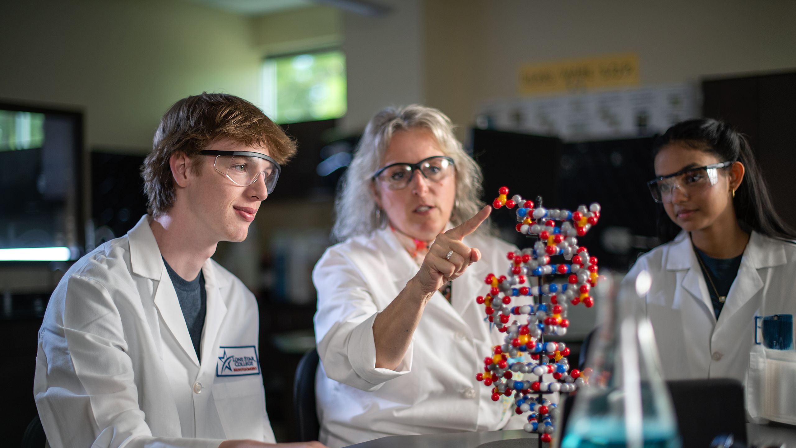 Photo of scholarship recipients and their family