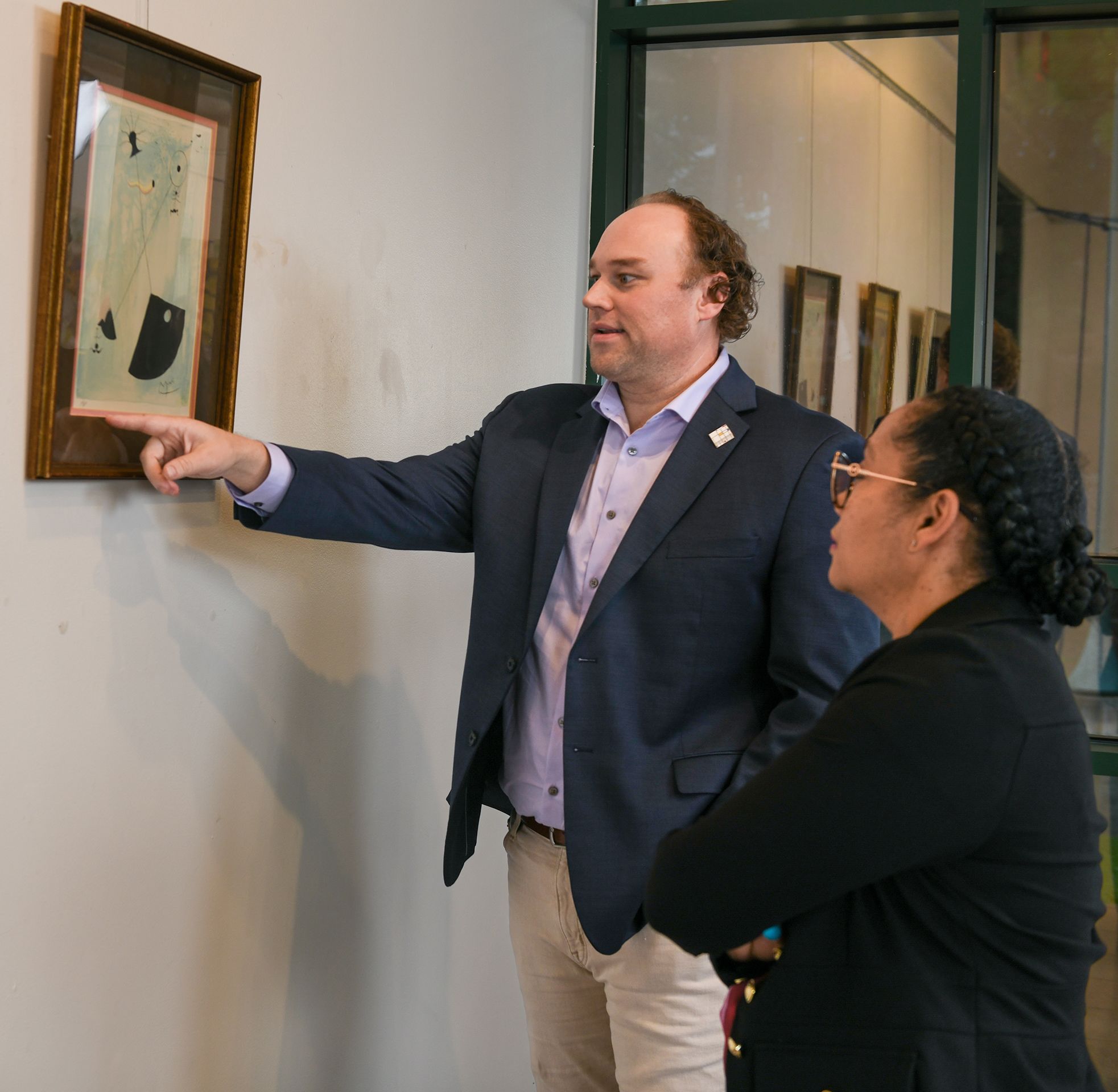 Students talking in a lecture hall during class